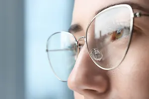 Close up of a woman wearing glasses