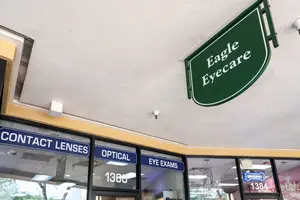 Eagle Eyecare optical shop with a sign for contact lenses and eye exams