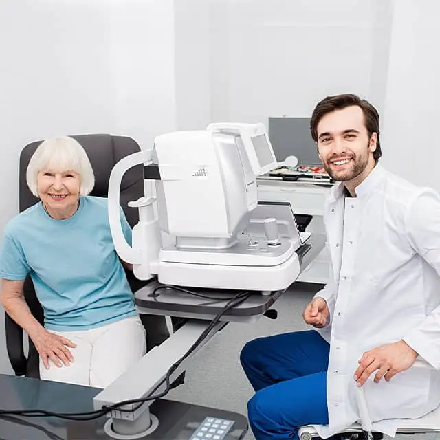 Eye doctor and patient with optical device