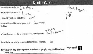 A handwritten note with feedback from a patient on their visit to a healthcare provider, mentioning positive aspects such as good work and excellent staff, and requesting a review on Google, Yelp, and Facebook.