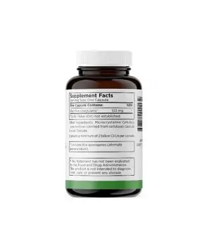 A bottle of dietary supplement with a label displaying its supplement facts.