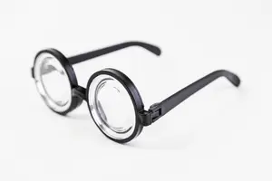 A pair of black frame glasses with clear lenses on a white background