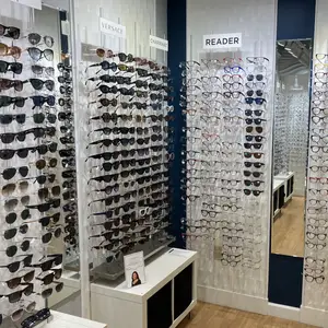 a display of sunglasses and reading glasses in a store