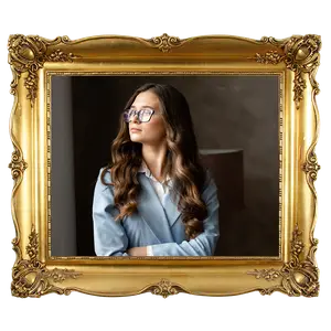A picture of a woman in a gold picture frame