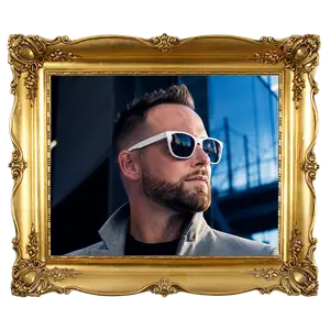 portrait of a man with a beard wearing white sunglasses in a gold frame