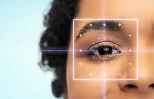 A close-up image of a woman's face with a square-shaped overlay on her eye, possibly indicating a technology or medical-related concept.