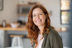Woman smiling in a kitchen
