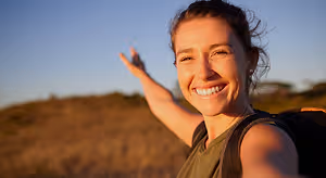woman smiling outdoors