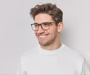 Smiling man wearing glasses