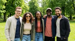 Group of young adults standing outside in a park
