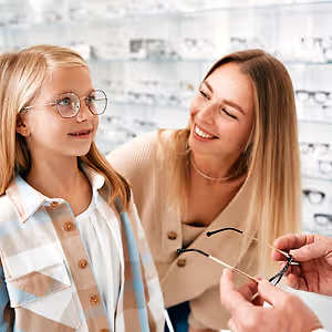 child picking new eyewear