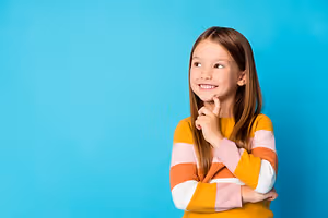 Image of a smiling girl posing for a picture