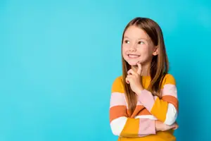 Image of a smiling girl posing for a picture