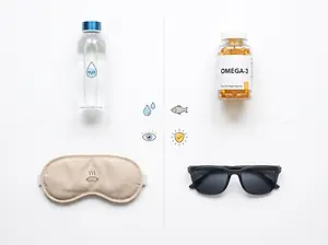 Flat lay of a water bottle, Omega-3 supplement bottle, sunglasses, eye mask, and icons for water, fish, eye protection, and sleep