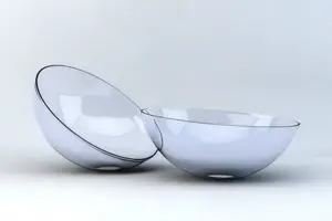 Two transparent glass bowls on a white background