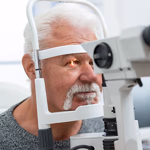 senior man having comprehensive eye exam