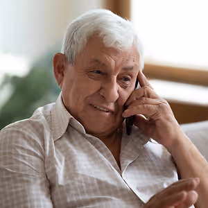 senior man talking on mobile phone