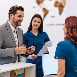 patient talking to receptionist