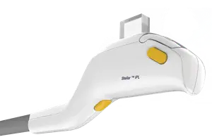 Image of a Stellar IPL device with two yellow buttons and the words Stellar IPL