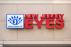 New Jersey Eyes logo on a building with a blue square featuring an eye icon and Bruce Mazie, O.D. text
