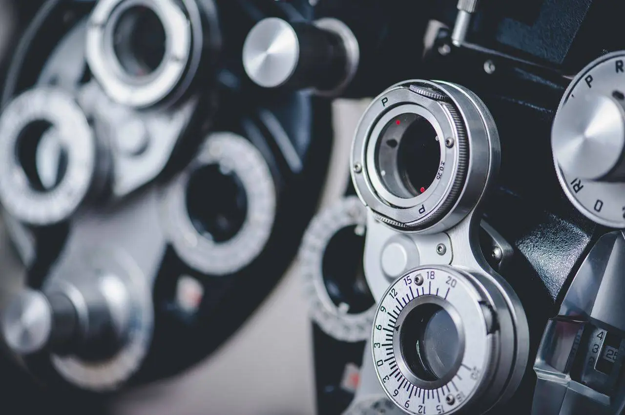 Eye doctor's phoropter in focus with blurry background