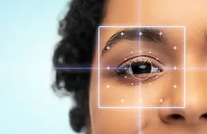 An artistic close-up of a woman's face with a square overlay highlighting her eyes and a blue line intersecting her forehead, possibly representing a biometric identification technology.