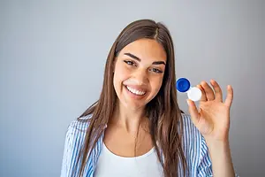 Woman carrying contacts case