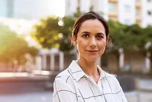 portrait of a woman smiling and looking at the camera