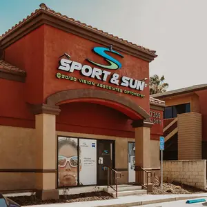 Exterior of Sport & Sun Vision Associates Optometry with an image of a woman wearing goggles on the glass door.