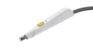 image of a white handheld device with a yellow button and a silver tip